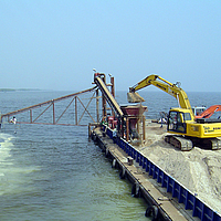 Filling groynes and breakwaters for coastal protection