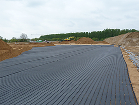 Fortrac geogrid in the process of laying for soil reinforcement projects