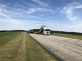 Road asphalting with SamiGrid® composite and use of a Term machine