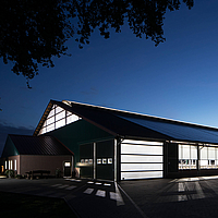 Aerial view of a well-lit barn - Modern lighting for excellent animal welfare