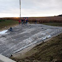 Filling Incomat Crib concrete mat with concrete pump