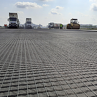 HaTelit installation on airplane runway surrounded by construction vehicles