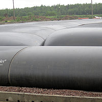 Multiple filled SoilTain dewatering tubes 