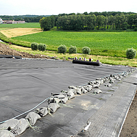 Efficient surface sealing: HUESKER clay liners and geogrids